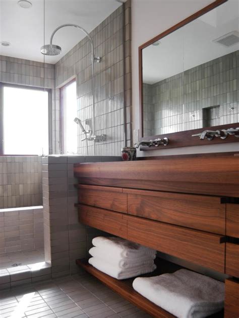 The surprising subway tile trend transforming our bathrooms. Modern Gray Subway Tile Bathroom With Floating Vanity | HGTV
