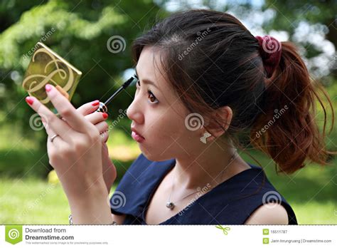 Young Woman Applying Mascara Using Lash Brush Stock Image Image Of