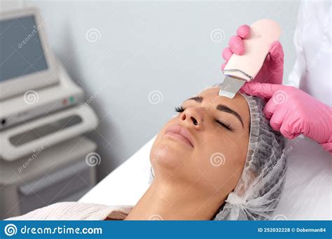 Beautiful Woman Receiving Ultrasound Cavitation Facial Peeling Cosmetology And Facial Skin Care