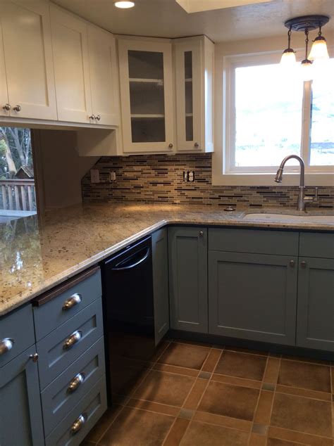 Hampton bay shaker satin white stock assembled wall kitchen cabinet (30 in. Custom kitchen with white upper cabinets and French blue lower cabinets. Granite top with glas ...