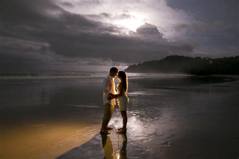 Wedding Couple On The Beach Under Full Moon