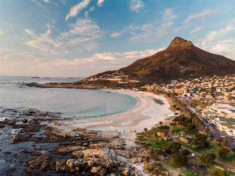 Aerial View Of Camps Bay Beach And Lions Head Mountain At Sunset Cape
