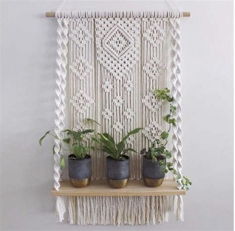 Overall size is 14 wide x 26 long and it is made with gold colore Bohemian Wooden Handmade Macrame Wall Hanging Rope Shelf ...