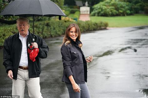 President Trump Leaves Melania In The Rain Without An Umbrella On Their
