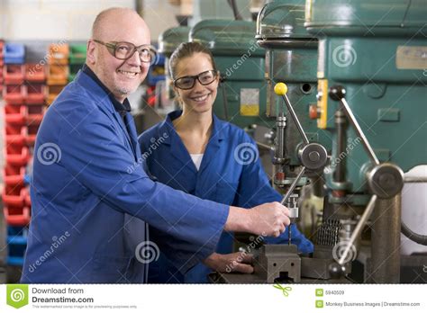 Two Machinists Working on Machine Stock Image - Image of jobs, length ...