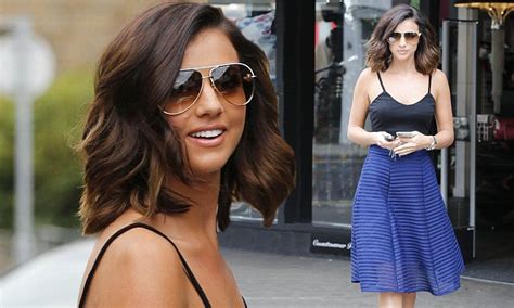 Lucy Mecklenburgh Looks Elegant In A Black Bralet And Cobalt Midi Skirt As She Steps Out After