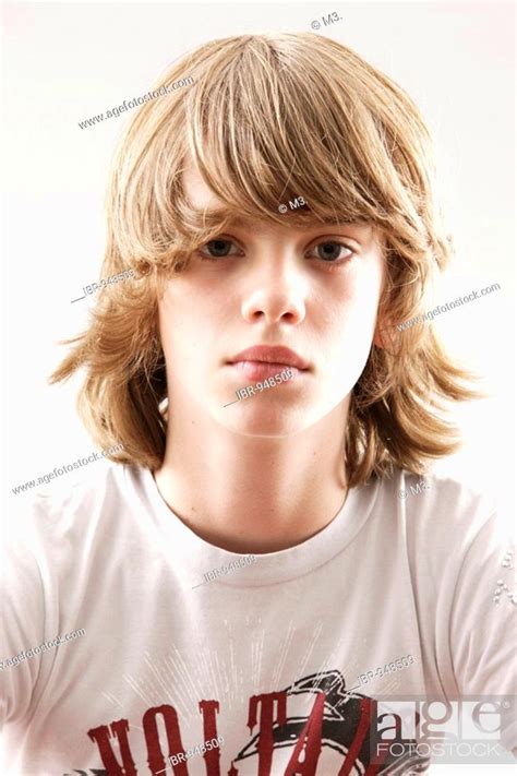 12 Year Old Boy Looking Into The Camera Stock Photo Picture And