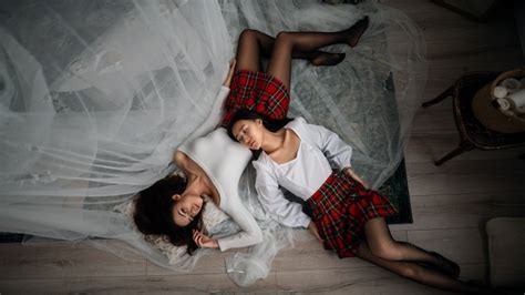 4k asian cosplay bed brunette girl lying down hands skirt legs stockings bowknot