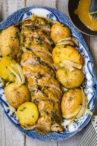 This slow cooker pork tenderloin is simmered in a garlic and herb gravy and produces perfect results every time. Honey Mustard Pork Tenderloin and Potatoes - The Cookie ...
