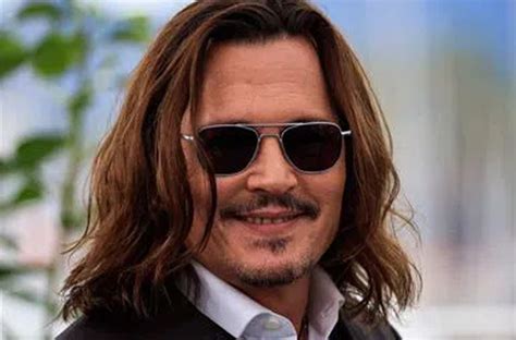Johnny Depp Says Hes Proud Of His Rotting Teeth With Loads Of