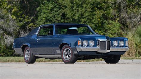 The 1970 model was essentially a carryover from the previous year except that the grille itself now featured vertical slats, and vertical hash marks appeared on the front fenders just behind the front wheels. 1970 Pontiac Grand Prix SJ | T133 | Kissimmee 2018