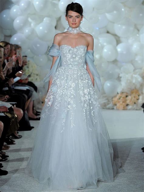 A silver studded belt that cinches at the chest and the powder blue layers that descend like a waterfall makes it irresistible. Inspirational Powder Blue Wedding Dress Check more at http ...