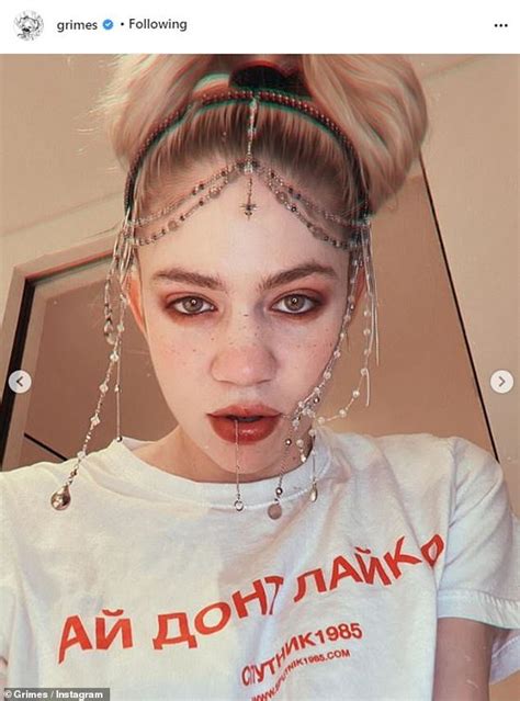 Elon Musks Girlfriend Grimes Shares Video Of Her Latest Inking Of