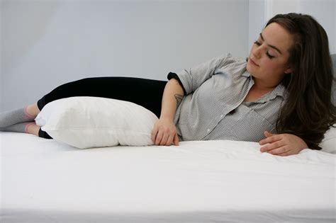 I learn to put a pillow between my legs when i sleep on my side to prevent me from rolling onto my stomach. I AM Stomach Sleeper | Sleepopolis