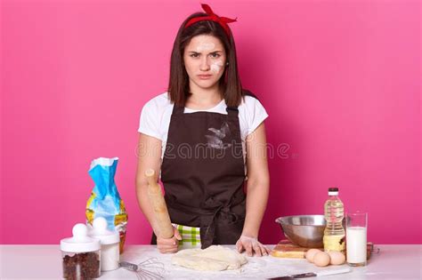 Angry Housewife Dressed Kitchen Apron Dirty With Flour T Shirt Red Headband Holds Rolling Pin