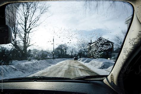 View Outside The Car Window In Winter By Cara Dolan Stocksy United