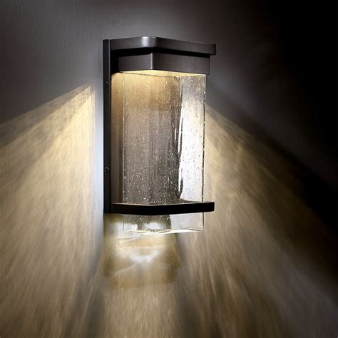 Led cylinders wall sconce with vertical and horizontal accent bars. Vitrine LED Outdoor Wall Sconce by Modern Forms