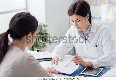 Female Doctor Giving Consultation Patient Explaining Stock Photo Edit