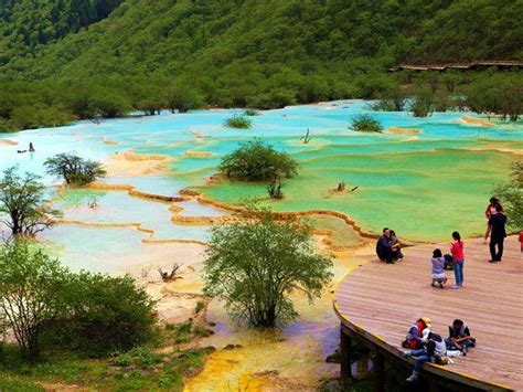 Hidden Colorful Pools In Huanglong Scenic Reserve Valley In Huanglong