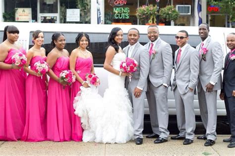 Pink and amber lighting and marvellous centerpieces set the stage at wedding reception decoration. Hot pink wedding bridal party fuchsia mermaid dress ...