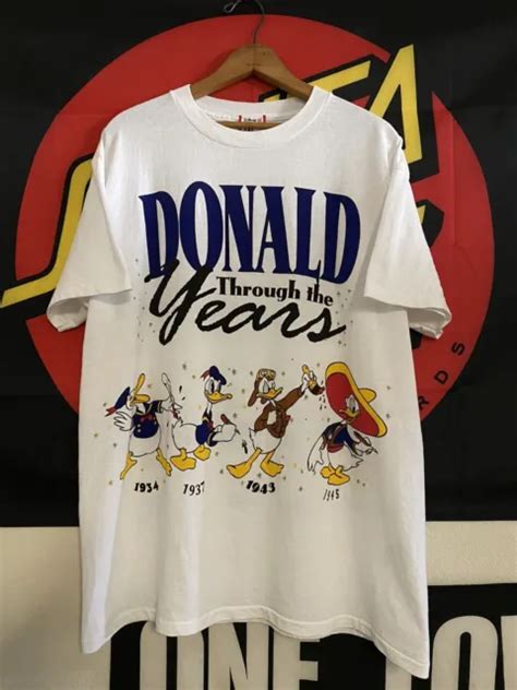 Vintage 90s Disney Donald Duck Through The Years Cartoon Aop T Shirt 22