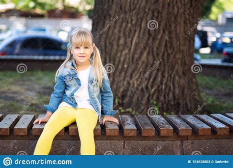 Adorable Blond Caucasian Preschooler Fashionista Girl Wearing Jeans And