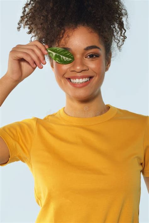 Natural Beauty Happy Afro American Girl In Yellow Tshirt With Curly