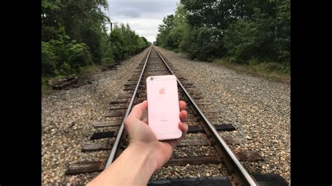 What Happens When You Hit An Iphone With A Train Youtube