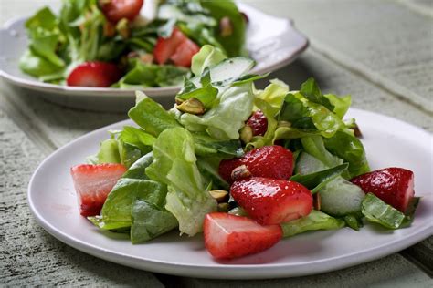 Tender Green Salad With Strawberries Cucumber Pistachio And Basil
