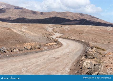 Dry Dusty Road Leads Into The Mountains Stock Image Image Of Sand