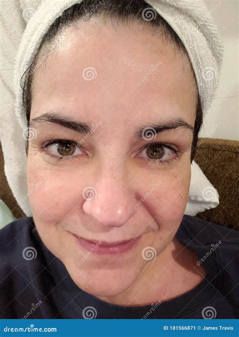 Overweight 54 Year Old Woman With Towel On Head No Makeup Stock Image 181566871