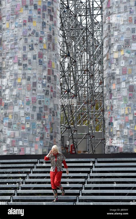 Argentinian Artist Marta Minujin Descende The Steps In Front Of Her