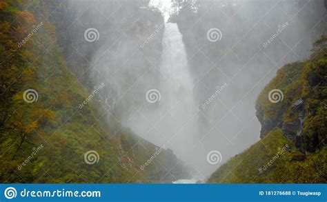 Beautiful Scene Of Kegon Waterfall With Mist Among Colorful Autumn
