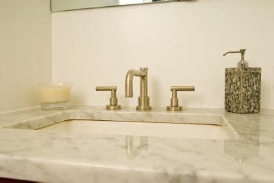 If the new vanity is not installed immediately, temporarily stuff a rag into the drain pipes. Removing a Glued-Down Cultured-Marble Countertop From a ...