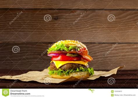 Fresh Delicious Burger On A Wooden Background Stock Photo Image Of