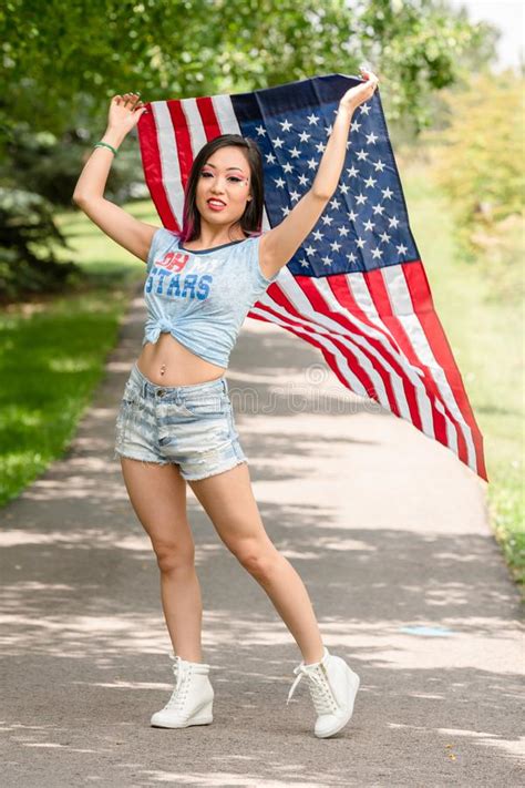 beautiful asian girl posing in the american independence day stock image image of asian