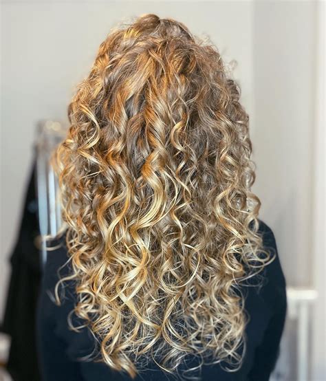 blonde highlights on curly hair