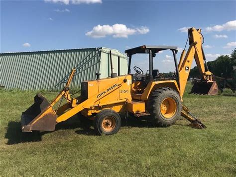 6410 tractor pto won't engage 410 backhoe power steering problem jd1530 hydraulics jd 4010 jd 425 weird problem jd 4400 hst forward/reverse pedals hard to push 1960's jd 3020 gas lost steering jd300 brake problems John Deere 210C 310C 315C Backhoe Loader Service Repair Manual