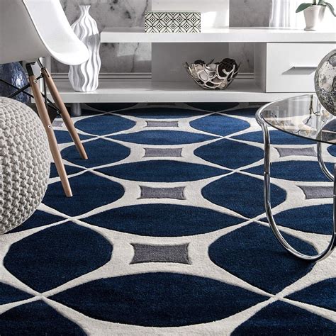 Featuring An Elegant Geometric Pattern In Rich Shades Of Navy Ivory