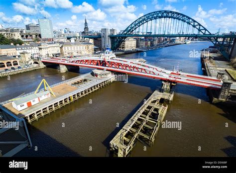 The Swing And Tyne Bridge Over The River Tyne At Newcastle Stock Photo