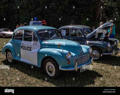 vintage morris minor police patrol car resored to its former glorry at classic car show