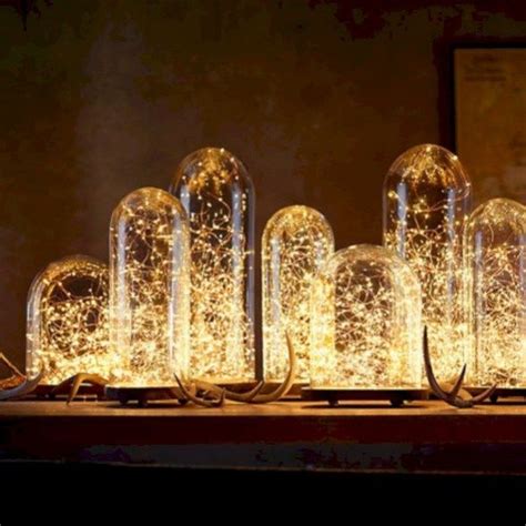 This absolutely lit decor is giving me major motivation to make over my bookshelf. 38 Fairy Lights Ideas for Holiday Decorating | Candle ...