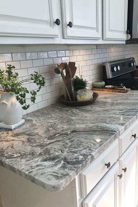 Granite surface because of its durability and longevity, granite is great for heavily used surfaces such as kitchen countertops, kitchen islands, backsplash and bathroom vanities. Image result for viscount white counter and white subway ...