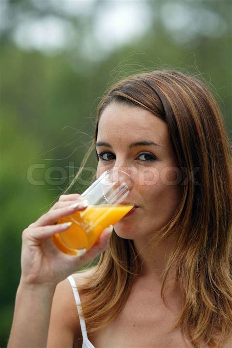 Woman Drinking Juice Outdoors Stock Image Colourbox