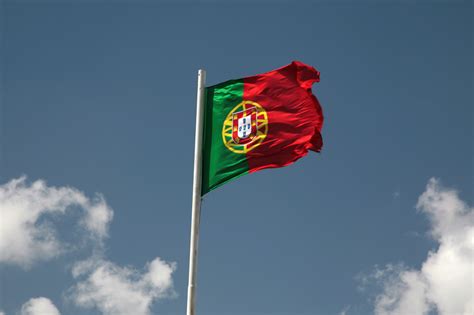 Green on the left (the shaft), red on the right (the wind). Flag of Portugal | Portugal Travel Guide Photos