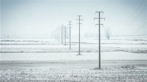Field Covered With Snow And Power Lines During Winter Hd