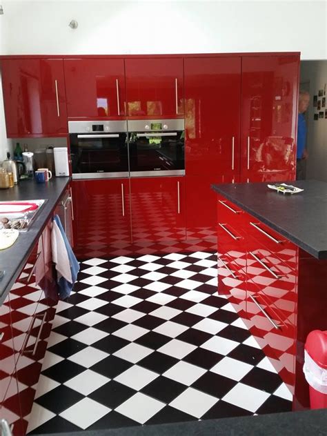 Red Gloss Kitchen With Checkered Black And White Floor Red Kitchen