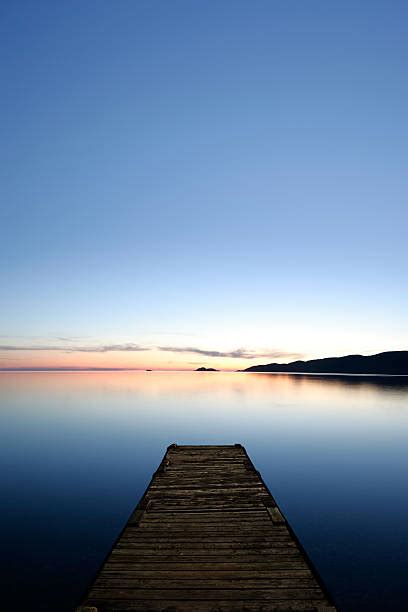 Lake Dock At Night Stock Photos Pictures And Royalty Free Images Istock