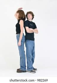 Two People Seeing Who Taller Than Foto Stock Shutterstock