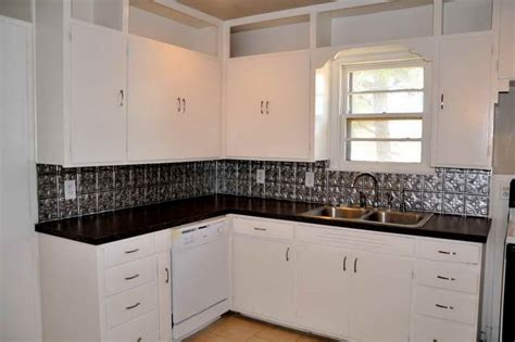 Moreover, these sinks are able to hold a large amount of water. Applying Tin Backsplash Ideas for Kitchen: Tin Backsplash ...